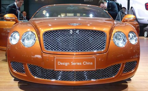 Automotive design, Vehicle, Grille, Car, Automotive lighting, Bentley, Headlamp, Orange, Performance car, Personal luxury car, 