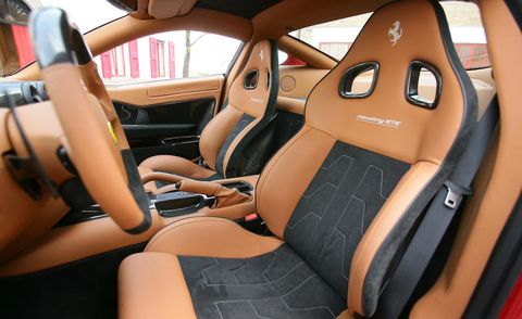 Motor vehicle, Steering part, Brown, Automotive design, Steering wheel, Car seat, Vehicle door, Car seat cover, Orange, Center console, 