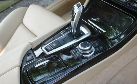 Luxury vehicle, Personal luxury car, Kitchen appliance, Small appliance, Center console, Gear shift, Kitchen appliance accessory, Major appliance, Silver, Home appliance, 