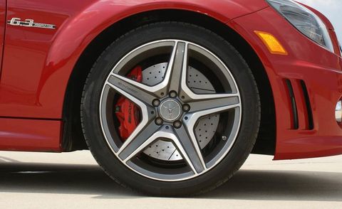 Tire, Wheel, Automotive tire, Automotive design, Automotive wheel system, Vehicle, Alloy wheel, Rim, Automotive exterior, Red, 