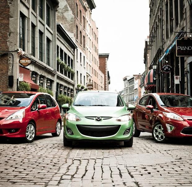 2010 honda fit sport, 2011 mazda 2 touring, and 2011 ford fiesta ses