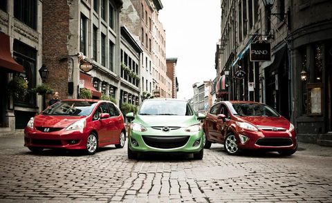 2010 honda fit sport, 2011 mazda 2 touring, and 2011 ford fiesta ses