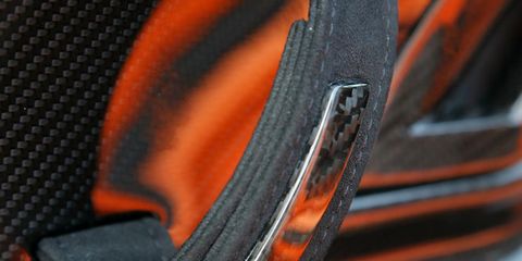 Orange, Amber, Bicycle wheel rim, Composite material, Bicycle tire, Close-up, Carbon, Synthetic rubber, Steel, Bicycle part, 