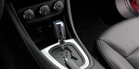 Motor vehicle, Automotive design, Gear shift, Steering wheel, Steering part, Luxury vehicle, Personal luxury car, Center console, Gauge, Leather, 