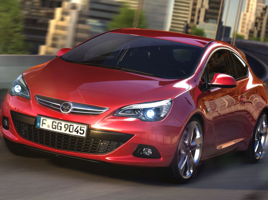 Opel Astra J Hatchback Photos and Specs. Photo: Opel Astra J