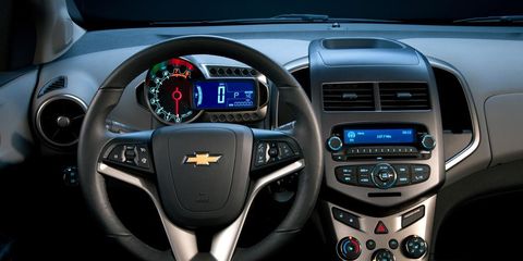 Motor vehicle, Blue, Steering part, Product, Automotive design, Steering wheel, Car, White, Technology, Automotive mirror, 