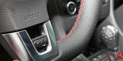 Automotive design, Steering part, Steering wheel, Carbon, Luxury vehicle, Personal luxury car, Gear shift, Center console, 