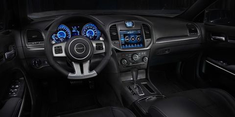 Motor vehicle, Steering part, Automotive design, Steering wheel, Vehicle audio, Center console, White, Car, Technology, Radio, 