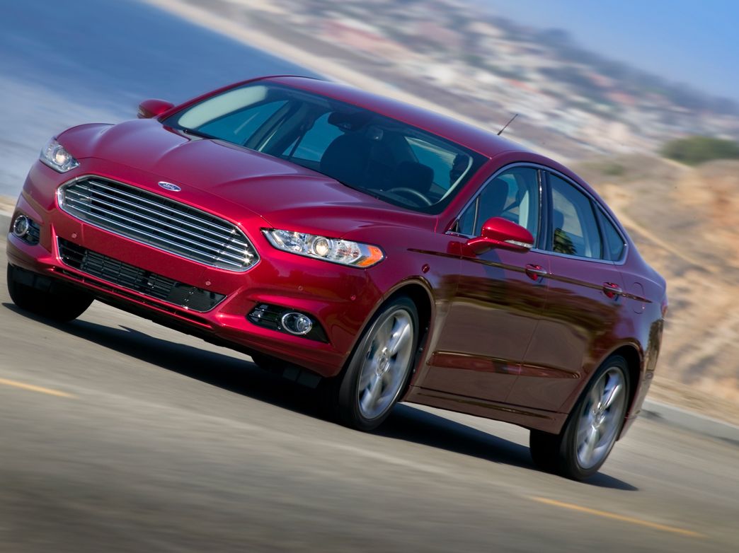 https://hips.hearstapps.com/hmg-prod/amv-prod-cad-assets/images/12q3/463430/2013-ford-fusion-16-and-20-ecoboost-first-drive-review-car-and-driver-photo-473333-s-original.jpg?fill=4:3&resize=1200:*
