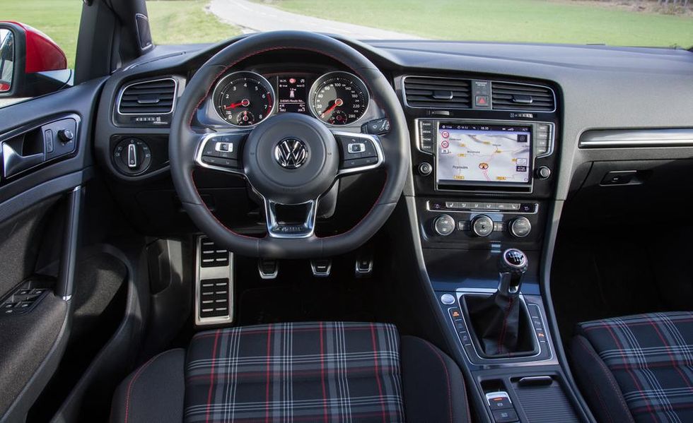 Tested: 2015 Volkswagen GTI vs. 2013 Ford Focus ST