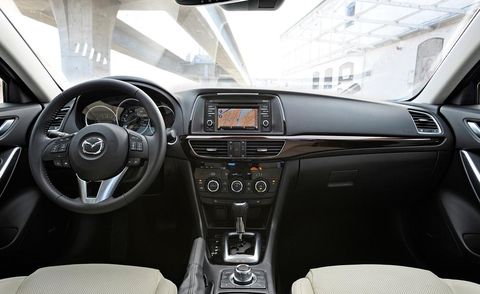 Automotive design, Steering part, Automotive mirror, Steering wheel, Vehicle audio, Center console, White, Technology, Car, Electronic device, 