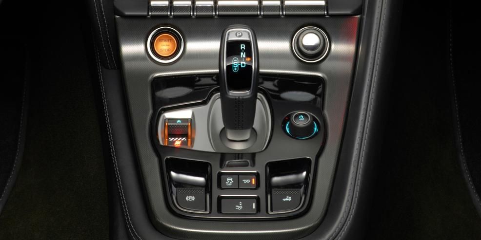 Center console, Luxury vehicle, Vehicle audio, Gear shift, Steering wheel, Steering part, Personal luxury car, Silver, Multimedia, Radio, 