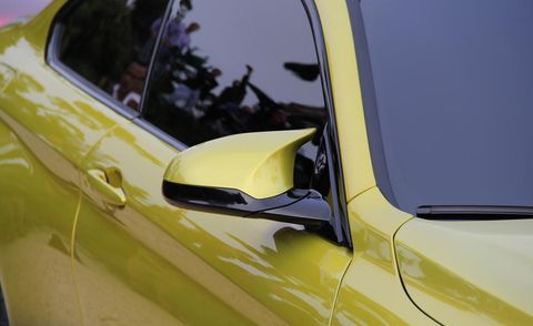 Motor vehicle, Yellow, Automotive exterior, Glass, Automotive design, Vehicle door, Car, Fender, Hood, Fixture, 