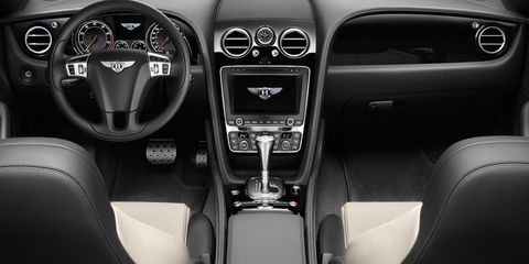 Motor vehicle, Automotive design, Product, Steering part, Transport, Center console, Vehicle audio, Steering wheel, White, Car, 
