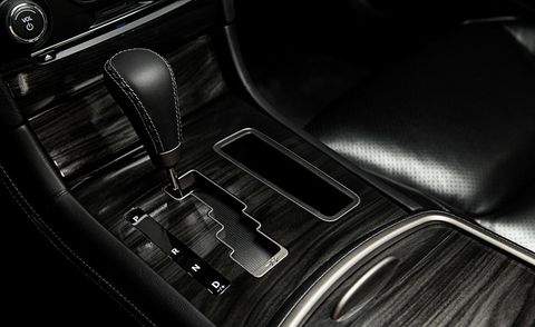 Automotive design, Gear shift, Personal luxury car, Vehicle door, Center console, Luxury vehicle, Leather, Carbon, Silver, Steel, 