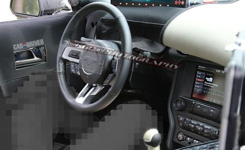 Motor vehicle, Steering part, Product, Steering wheel, Vehicle audio, Center console, White, Technology, Electronic device, Radio, 
