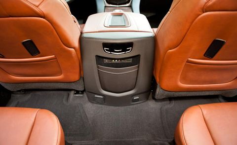 Motor vehicle, Brown, Automotive design, Orange, Car seat, Tan, Luxury vehicle, Leather, Car seat cover, Brand, 