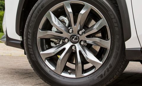 Tire, Wheel, Automotive tire, Alloy wheel, Automotive wheel system, Automotive design, Rim, Spoke, Automotive exterior, Synthetic rubber, 