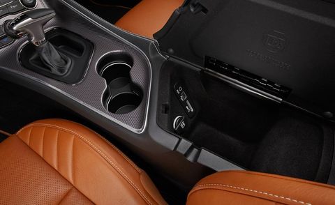 Orange, Tan, Leather, Car seat, Auto part, Luxury vehicle, Peach, Carbon, Car seat cover, Supercar, 
