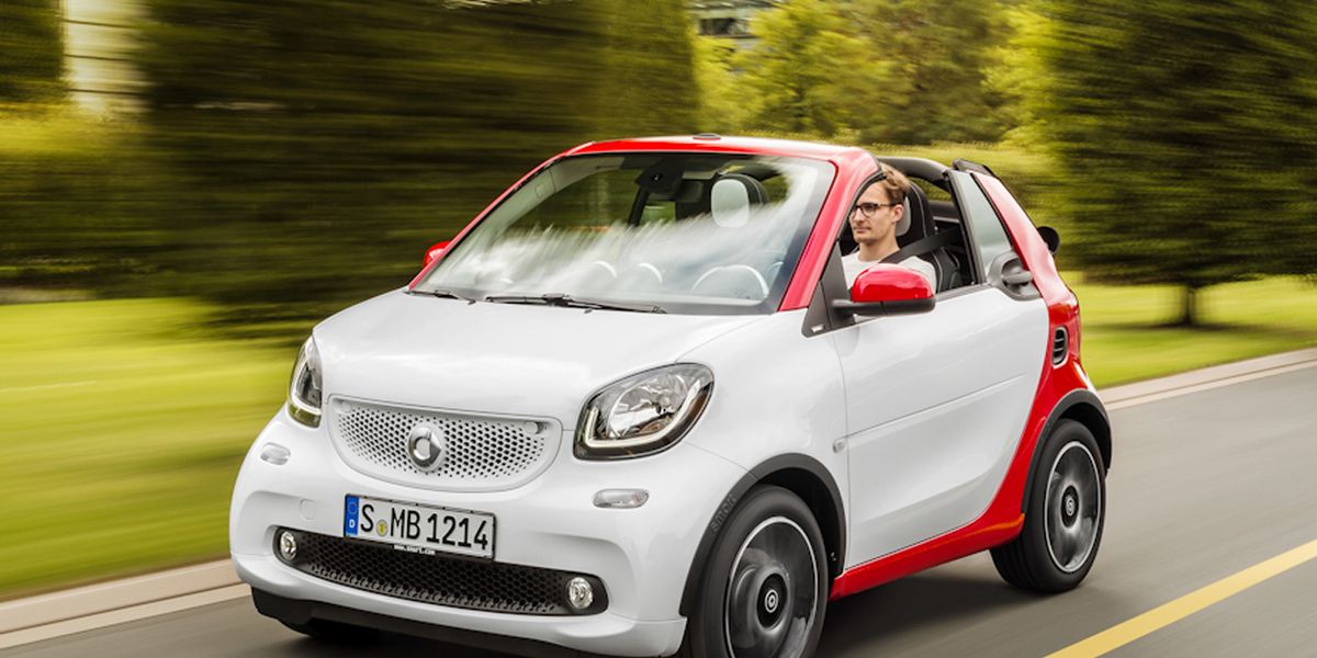 https://hips.hearstapps.com/hmg-prod/amv-prod-cad-assets/images/16q1/665019/2017-smart-fortwo-cabriolet-first-drive-review-car-and-driver-photo-665504-s-original.jpg?fill=2:1&resize=1200:*