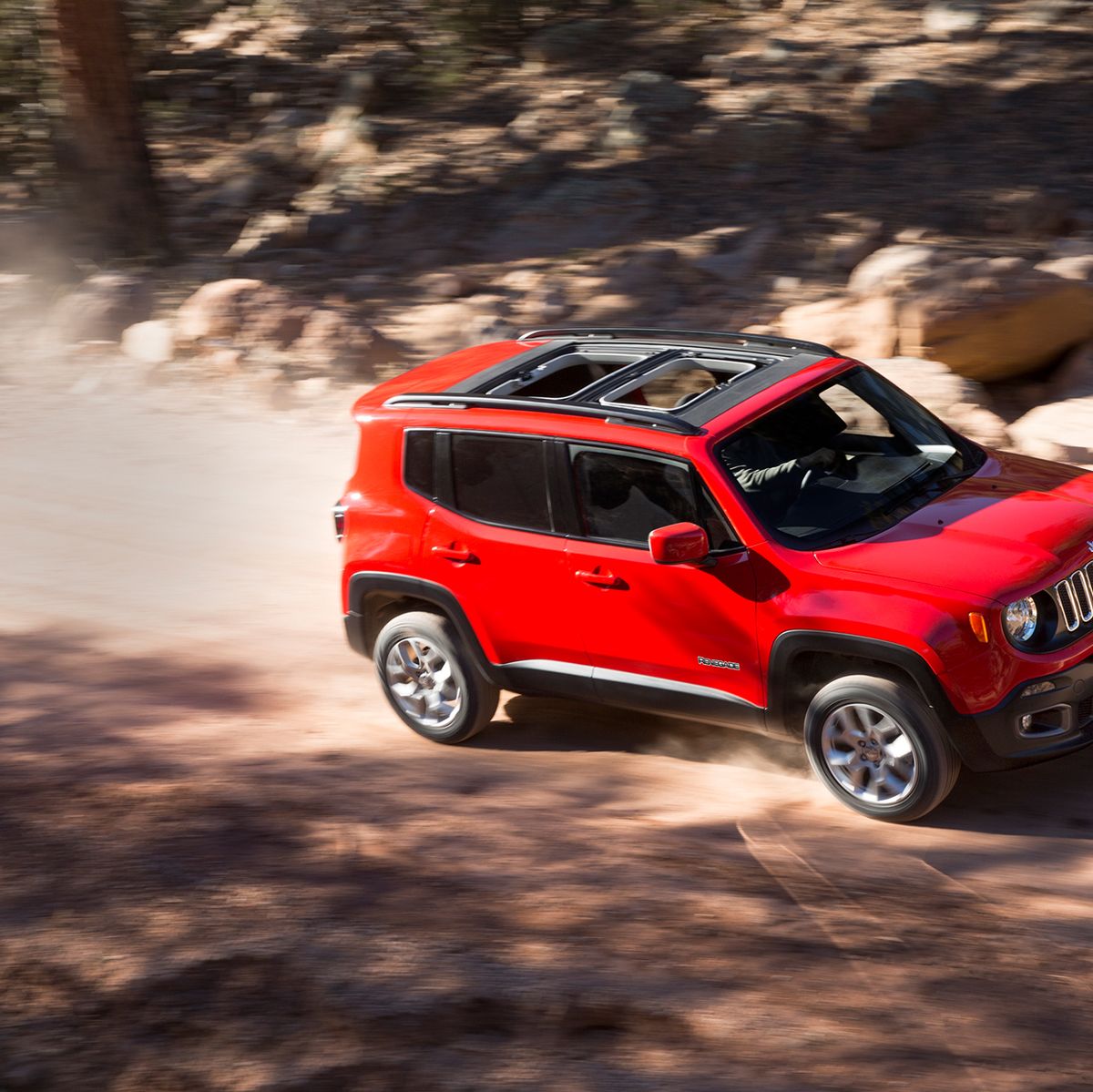 https://hips.hearstapps.com/hmg-prod/amv-prod-cad-assets/images/17q4/692997/2018-jeep-renegade-review-car-and-driver-photo-698735-s-original.jpg?crop=0.558xw:0.913xh;0.325xw,0&resize=1200:*
