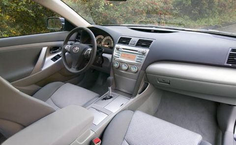 Motor vehicle, Steering part, Brown, Steering wheel, Automotive mirror, Vehicle, White, Center console, Vehicle door, Car, 