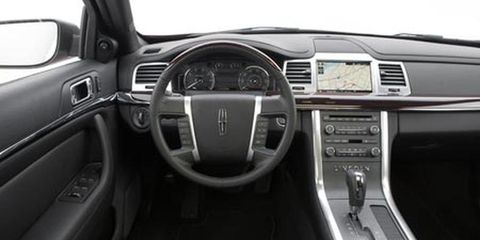 Motor vehicle, Steering part, Steering wheel, Product, Center console, Automotive design, Vehicle audio, Car, White, Technology, 
