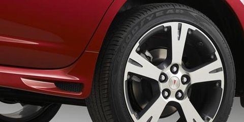 Tire, Wheel, Alloy wheel, Automotive tire, Automotive wheel system, Vehicle, Automotive design, Rim, Red, Car, 