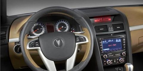Mode of transport, Steering part, Steering wheel, Automotive design, Car, Center console, Technology, Speedometer, Gauge, Black, 