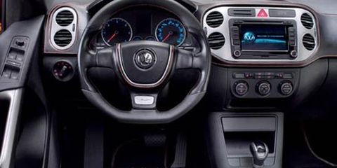 Motor vehicle, Blue, Mode of transport, Automotive design, Product, Steering wheel, Steering part, White, Technology, Car, 