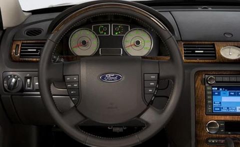 Motor vehicle, Steering part, Product, Brown, Steering wheel, Automotive design, White, Technology, Electronic device, Car, 