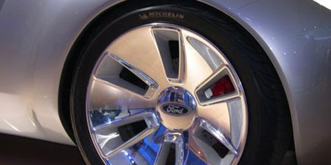 Tire, Wheel, Motor vehicle, Automotive tire, Automotive design, Blue, Alloy wheel, Automotive wheel system, Transport, Rim, 