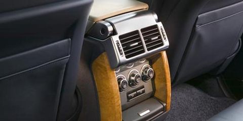 Motor vehicle, Automotive design, Steering wheel, Vehicle door, Steering part, Luxury vehicle, Car seat, Center console, Gear shift, Leather, 
