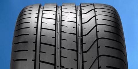Tire, Automotive tire, Blue, Rim, Synthetic rubber, Automotive wheel system, Tread, Carbon, Azure, Black, 
