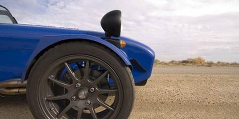 Tire, Wheel, Automotive tire, Blue, Automotive design, Alloy wheel, Vehicle, Automotive wheel system, Rim, Automotive exterior, 