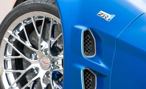 Motor vehicle, Blue, Automotive design, Alloy wheel, Automotive tire, Automotive wheel system, Automotive exterior, Rim, Spoke, Fender, 