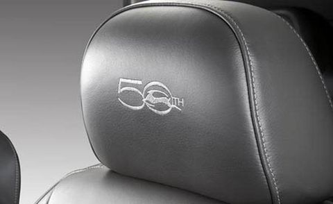 Automotive design, Logo, Leather, Luxury vehicle, Silver, Gloss, Symbol, Gear shift, Carbon, Head restraint, 