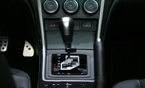Center console, Gear shift, Vehicle audio, Luxury vehicle, Machine, Personal luxury car, 