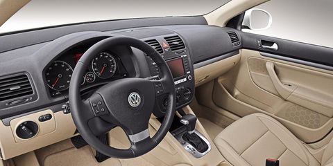 Motor vehicle, Steering part, Mode of transport, Automotive design, Product, Brown, Steering wheel, Automotive mirror, Transport, White, 