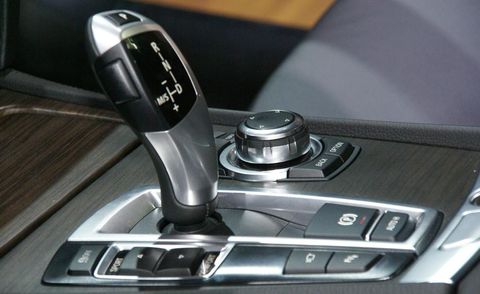 Luxury vehicle, Gear shift, Machine, Personal luxury car, Silver, Gadget, Golf club, Exercise equipment, Iron, Carbon, 