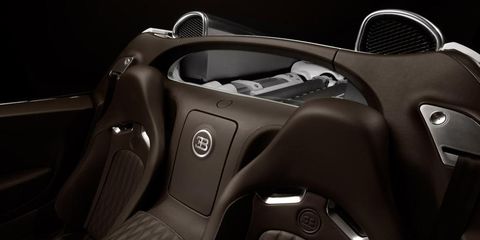 Automotive design, Steering wheel, Luxury vehicle, Steering part, Design, Personal luxury car, Sports car, Center console, Silver, Ford, 