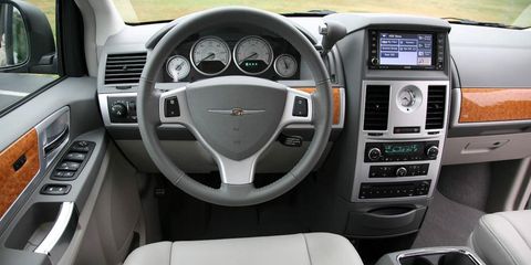 Motor vehicle, Steering part, Product, Automotive design, Steering wheel, Transport, White, Technology, Center console, Car, 