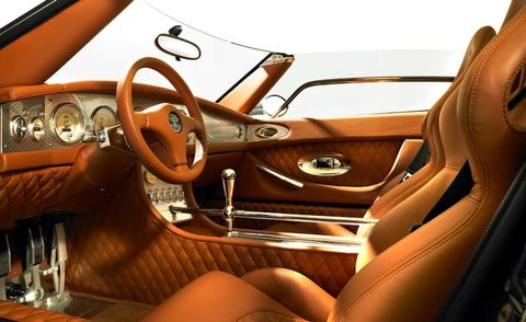 Motor vehicle, Steering part, Mode of transport, Brown, Steering wheel, Automotive design, Vehicle door, Car seat, Car, Personal luxury car, 