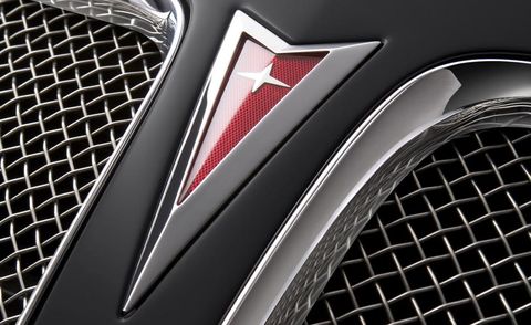 Automotive design, Grille, Automotive exterior, Logo, Carbon, Luxury vehicle, Personal luxury car, Black, Grey, Symbol, 