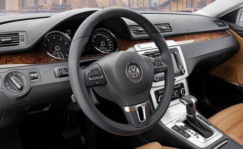 Motor vehicle, Steering part, Mode of transport, Automotive design, Brown, Product, Transport, Steering wheel, Automotive mirror, White, 