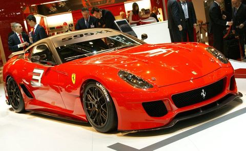 Wheel, Tire, Automotive design, Vehicle, Land vehicle, Event, Performance car, Car, Personal luxury car, Red, 