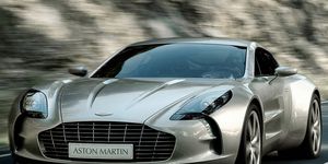 Automotive design, Vehicle, Car, Grille, Sports car, Rim, Performance car, Luxury vehicle, Personal luxury car, Black, 