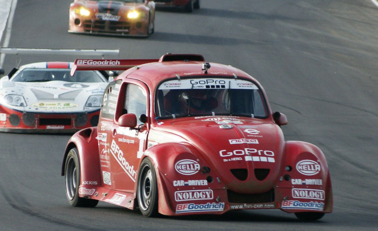 https://hips.hearstapps.com/hmg-prod/amv-prod-cad-assets/images/media/267475/volkswagen-beetle-fun-cup-racer-photo-254084-s-original.jpg