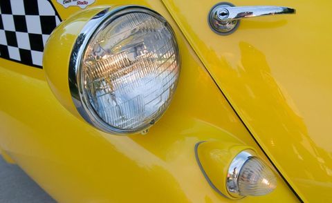 Motor vehicle, Yellow, Automotive lighting, Headlamp, Automotive parking light, Classic car, Car, Hood, Fender, Automotive exterior, 