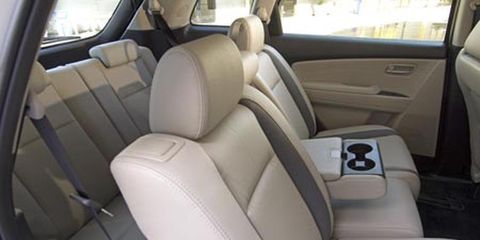 Motor vehicle, Mode of transport, Vehicle, Window, Car seat, Vehicle door, White, Car, Head restraint, Car seat cover, 